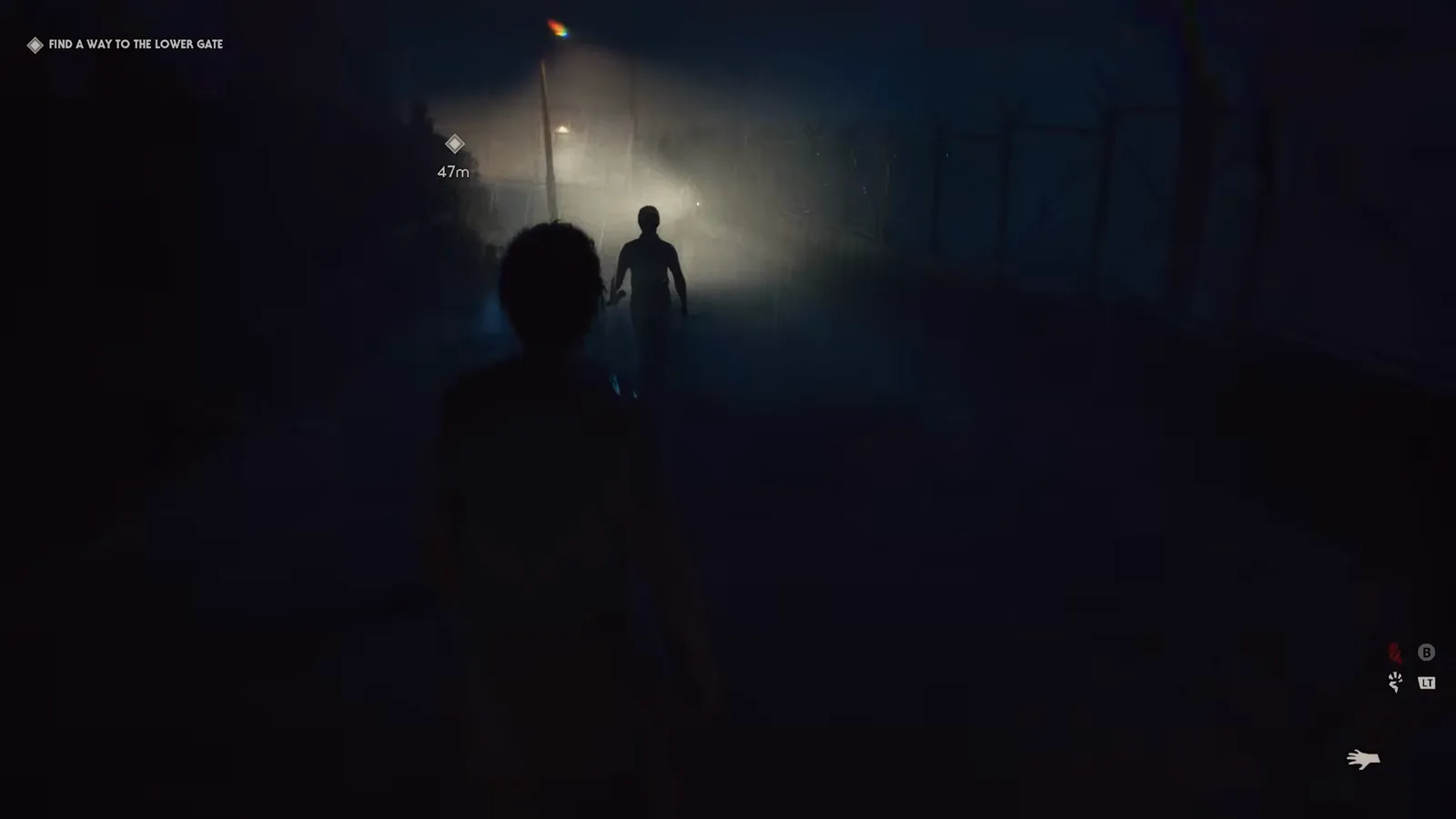 An orderly sweeping a flashlight across the rain at Smith's Grove while the FIND A WAY TO THE LOWER GATE objective and a 47-metre marker sit on the Halloween: The Game HUD